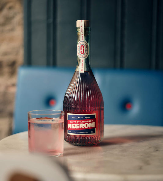 White Strawberry Negroni Bottle and Cocktail Serve