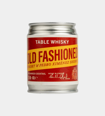 A miniature aluminum can of Table Whisky Old Fashioned, Whisky & Pedro Ximénez Pre-Mixed Cocktail, featuring a red and yellow label.